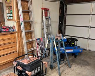 Three different ladders are in this shot, each with different uses.  The box on the lower left corner contains Lincoln Logs, a children's building toy.  