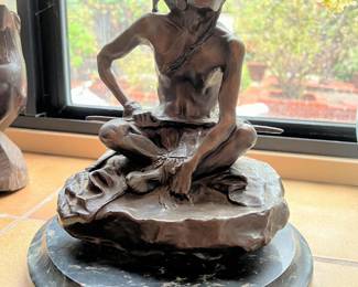 This is the seated figure statue.