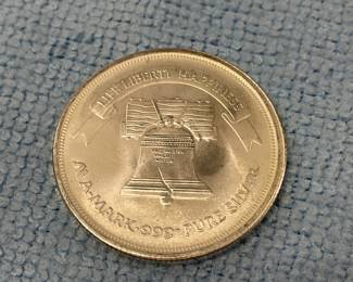 Several 1 ounce silver bouillon rounds