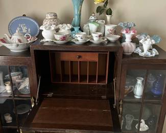 Beautiful secretary/desk.  Many Fenton pieces as well as others