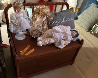 Jenny Lind toy box and porcelain dolls.