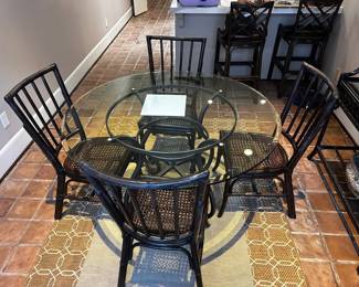 Asian Style Dining Table & 4 Chairs Great condition!  Table measures: 52” across x 29” tall  Must be able to move and load yourself
