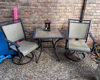 Swivel Chair Patio Set Needs a bit of a clean but overall great condition.  Must be a able to move and load yourself
