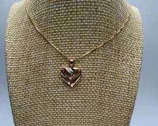 Elegant 14K Yellow Gold Open Heart Pendant & Chain - Triple Diamond Accent - 14K Gold Necklace

https://ctbids.com/estate-sale/42170/item/4819209/Elegant-14K-Yellow-Gold-Open-Heart-Pendant-Chain-Triple-Diamond-Accent-14K-Gold-Necklace
