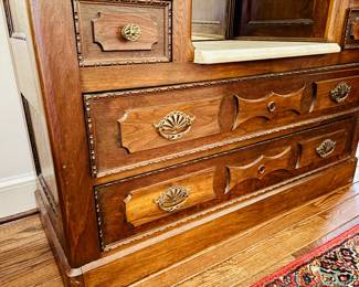 Antique Eastlake dresser with mirror and white marble tops (detail)...