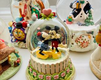 Selection of Disney and Christopher Radco snow globes...