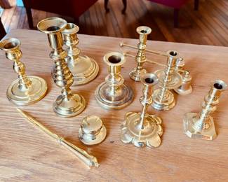 Large collection of brass candlesticks and brass lamps by Virginia Metalcrafters and Baldwin Brass...