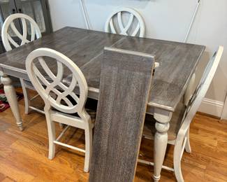 Wonderful country French influence is obvious in this cute dining set