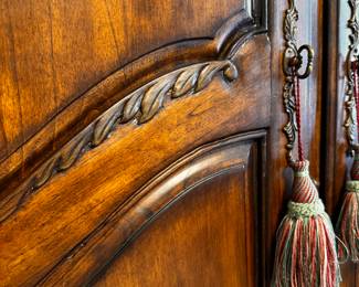 Simple, elegant scroll work. Solid wood