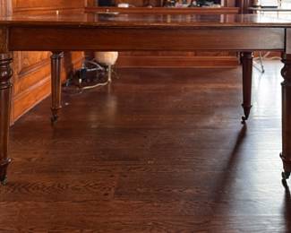 Three Drawer Mahogany Writing Desk on Casters.  Measures 60" W x 34" D x 31" H with 26" Clearance. Photo 6 of 6.