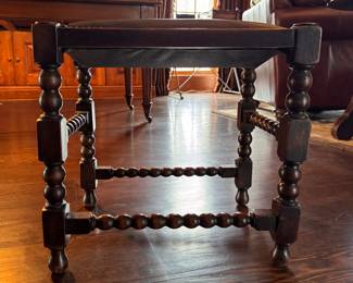 Antique Stool with Turned Legs and Stretchers and Leather Upholstered Seat. Measures 18" W x 14" D x 18" H. Photo 1 of 2. 