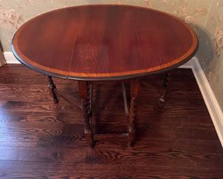 Satinwood Banded Mahogany Drop-Leaf, Barely-Twist Gate-Leg Table. Measures 46" x 34" x 29" H with Two 15.5" Drop Leaves. Photo 2 of 4. 