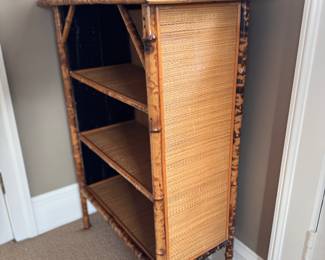 Tortoise Bamboo Bookshelf with Woven Cane Surfaces. Measures 28.5" W x 14" D x 38" H. Photo 2 of 3. 