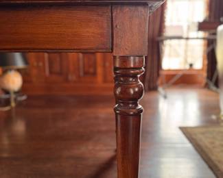 Three Drawer Mahogany Writing Desk on Casters.  Measures 60" W x 34" D x 31" H with 26" Clearance. Photo 4 of 6.