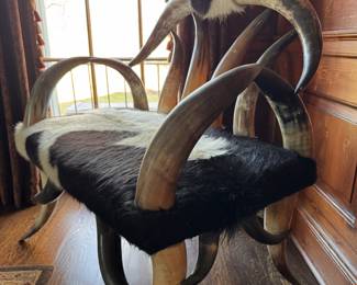 Texas Steer Horn Chair Upholstered In Cowhide. Measures 38" W x 26" D with 19" Seat Height. Photo 2 of 4. 