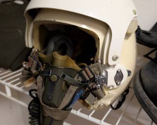 vintage military flight helmet, likely a USAF HGU-2A/P model from the 1960s, paired with an oxygen mask