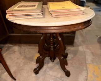 Antique round Victorian parlor table with white marble top