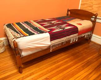 Pair of twin beds (previously bunk beds) and wood ladder