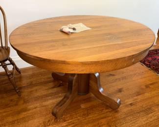 Solid oak Mission Style round pedestal dining table