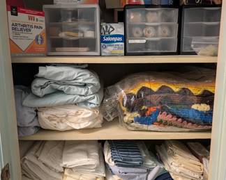 Lots of first aid supplies, blankets, and linens 