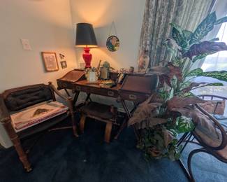 Contemporary desk with industrial style legs, vintage saddle stool, faux plans and more 