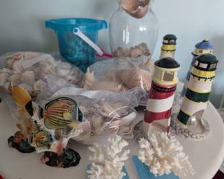 lighthouse candle votives, seashells, coral decor