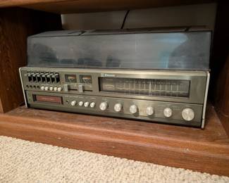vintage Emerson M-3000R Multiplex Stereo System, which includes a turntable, 8-track player, cassette recorder, and AM/FM radio