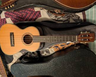 Alvarez Artist Series ukulele, likely the AU70WC Concert Ukulele or AU70T Tenor Ukulele, featuring a solid Sitka spruce top and walnut or mahogany back and sides