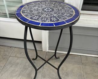 C75 - $25. Tile Top Table with Metal Base. Measures 14" round x 21" tall. 