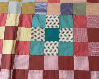 C147 - $50. Patchwork Quilt. Measures 49" x 66". Has some fading and discolored / stained spots. 