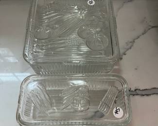 C130 - $30. 1940s Federal Glass Ribbed Refrigerator Dish Set. One minor chip noted on a lid. 