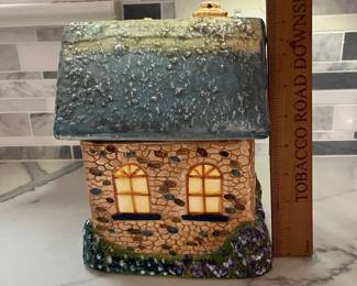 C133 - $20. Thomas Kinkade Canister. 