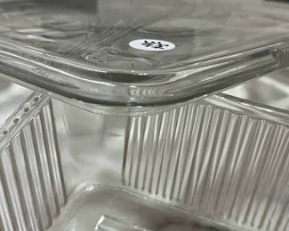 C130 - $30. 1940s Federal Glass Ribbed Refrigerator Dish Set. One minor chip noted on a lid. 