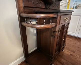 C81 - $275. Solid Wood Hall Tree - mirror has been replaced. Lots of carvings. Measures 39" wide x 16" deep x 88" tall. 