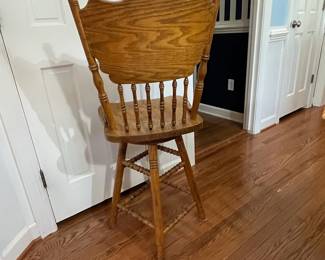 C10 - $85. Pair of Oak Swivel Bar Stools. Floor to top is 43". 