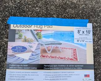 C156 - $25. Outdoor Area Rug. Measures 8' x 10'