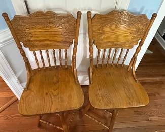 C10 - $85. Pair of Oak Swivel Bar Stools. Floor to top is 43". 