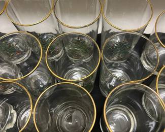 C137 - $150. Large Lot of Christmas Dishes. Glasses show the most wear on the gold trim. 