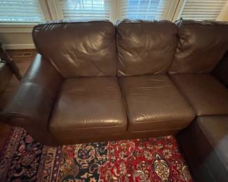 C83 - $500. Viceroy Leather Sectional. (Needs cleaned from dog hair) No rips / holes etc. Leather, Mocha, Hazelnut. Measures 87" from each corner. 34.5" deep x 34" tall. Floor to seat is 17.5" Seat is 21" deep. 