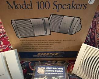 C144 - $50. Bose Model 100 Speakers with Mounting Brackets. 