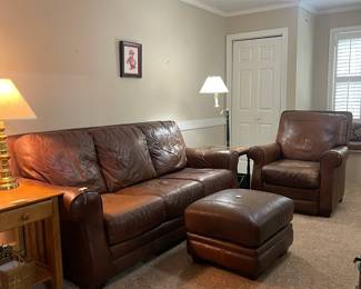 C29 - $200. Well Loved LANE Leather Couch, Ottoman and Recliner. Located on the 2nd story so we need 2 *strong* people that are able to move this. Couch is 83" long x 33" deep x 37" tall. No rips / holes but worn. Recliner is 37" wide x 34" deep x 40" tall. This is the most worn piece. 