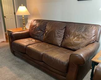 C29 - $200. Well Loved LANE Leather Couch, Ottoman and Recliner. Located on the 2nd story so we need 2 *strong* people that are able to move this. Couch is 83" long x 33" deep x 37" tall. No rips / holes but worn. Recliner is 37" wide x 34" deep x 40" tall. This is the most worn piece. 
