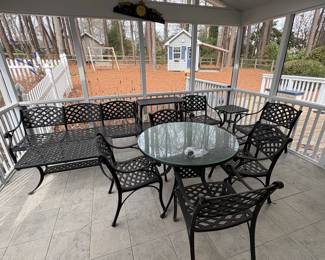Cast Aluminum Patio Set with Cushions & Covers. Purchased from Gole's Casual Furniture. 