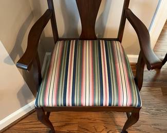 C19 - $45. Single Arm Chair. Measures 21.5" wide x 20" deep x 39" tall. (Upholstery matches dining set - similar style)