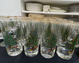 C137 - $150. Large Lot of Christmas Dishes. Glasses show the most wear on the gold trim. 