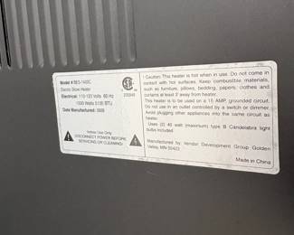 C73 - $50. Electric Fireplace. Measures 23" wide x 14" deep x 28.25" tall. 