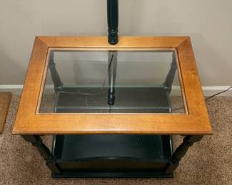 C30 - $40. Side table with Lamp. Dark green base with storage for books/magazines.  Measures 15.5" x 23" x 24" tall (with lamp is it 56.5" tall) 