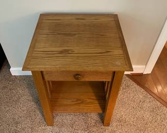 C31 - $40. Single Wooden Side Table with drawer. Measures 20" square x 25.25" tall. 1 minor blemish on the top. 