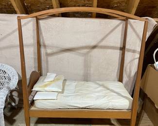 C110 - $60. Childs Toy Canopy Bed. Missing finials but could easily be replaced. Custom Handmade Bedding included. Measures 38.5" x 21.5" x 46" tall. 