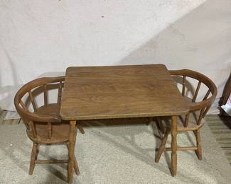 C112 - $40. Childs Table & 2 Chairs. Measures 26" x 20" x 21" tall. 